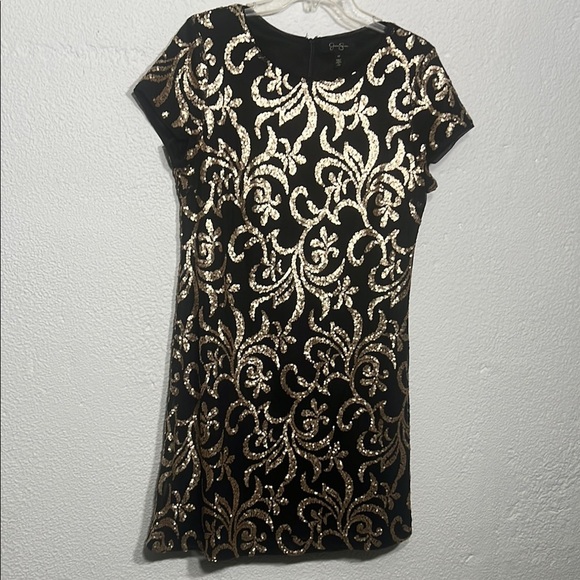 Jessica Simpson Dresses & Skirts - Jessica Simpson - Elegant Black and Gold sequence Dress size 10

Worn once